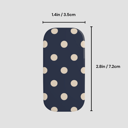 Navy blue pouch with beige polka dots and measurements on a light gray background