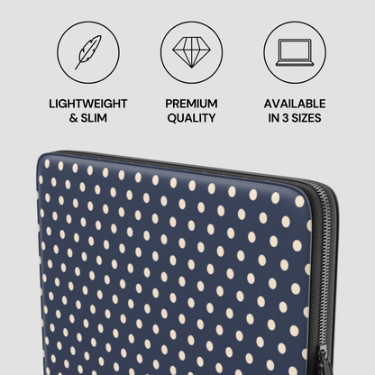 Polka dot laptop sleeve with product features on a gray background