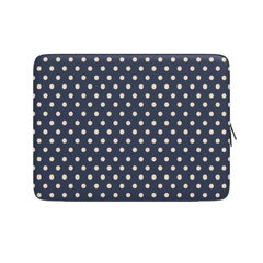 Navy blue laptop sleeve with white polka dots on a white background
