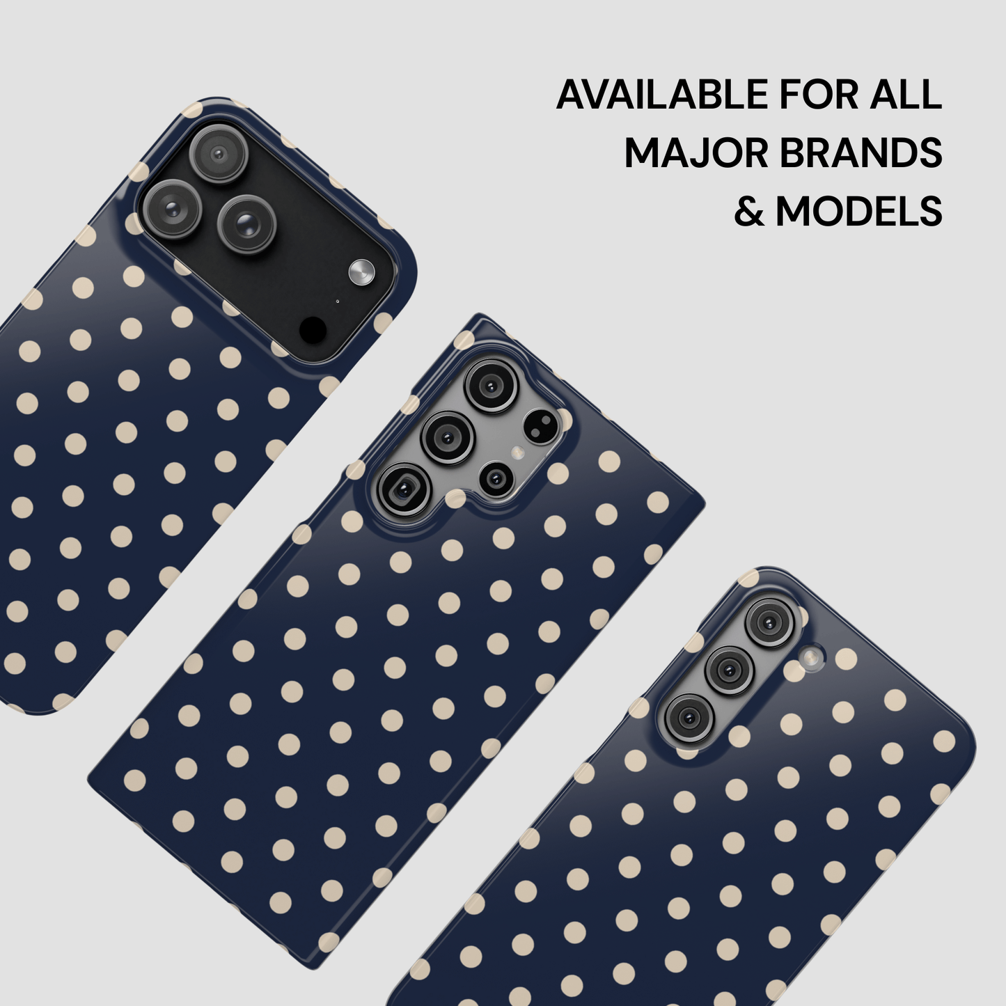Navy blue phone cases with white polka dots on a light gray background
