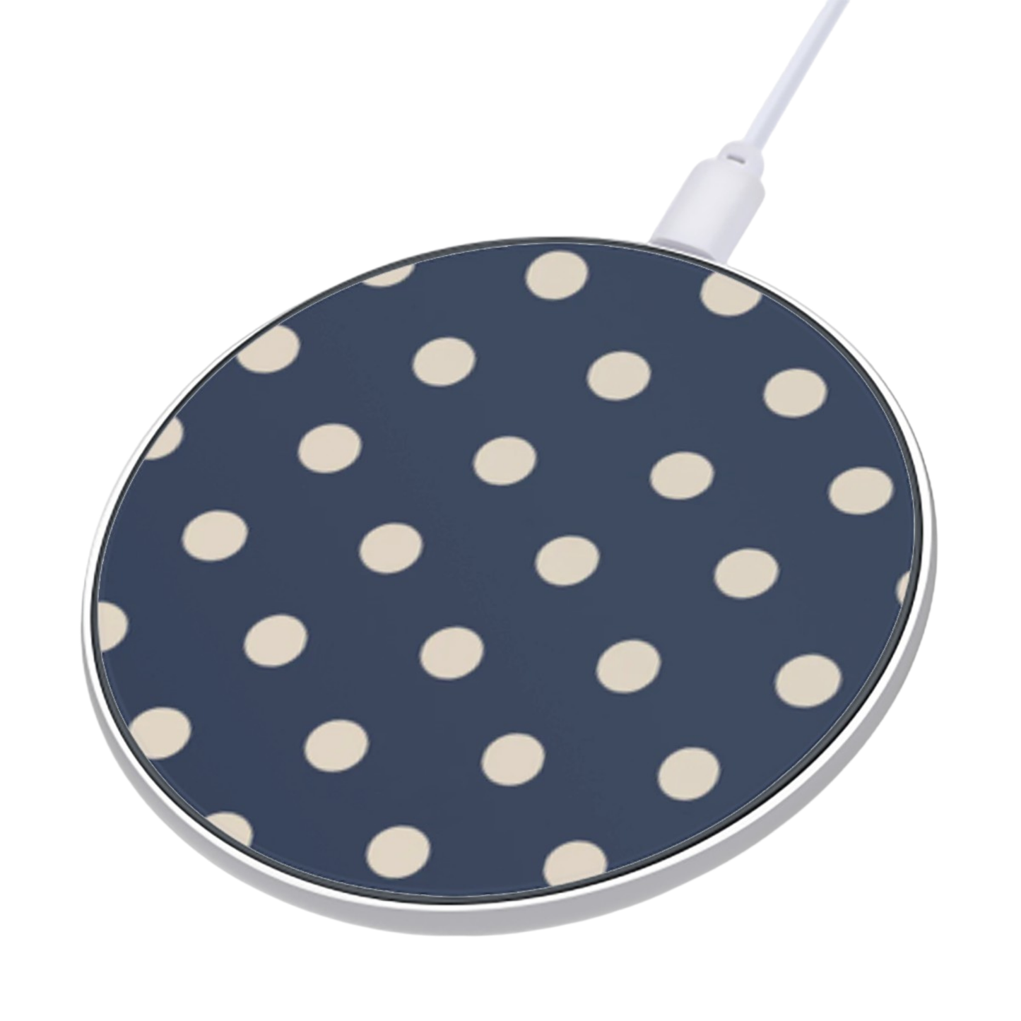 Wireless charging pad with polka dot pattern on a white background