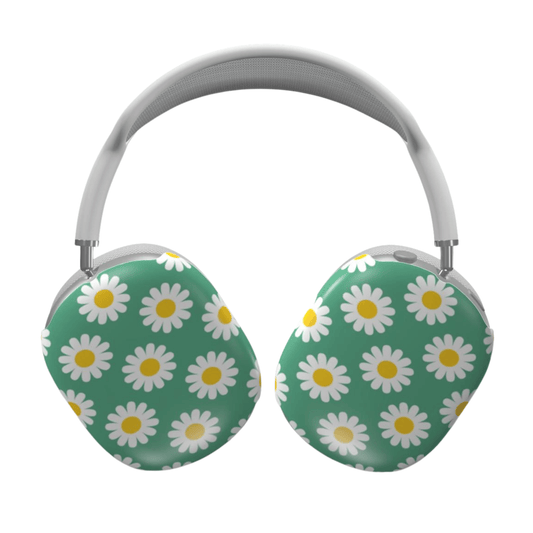 Headphones with daisy pattern on a green background