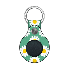 Keychain with daisy pattern on a green background