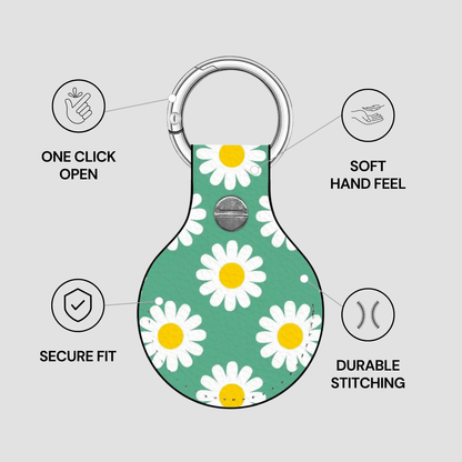 Keychain with daisy pattern on a gray background