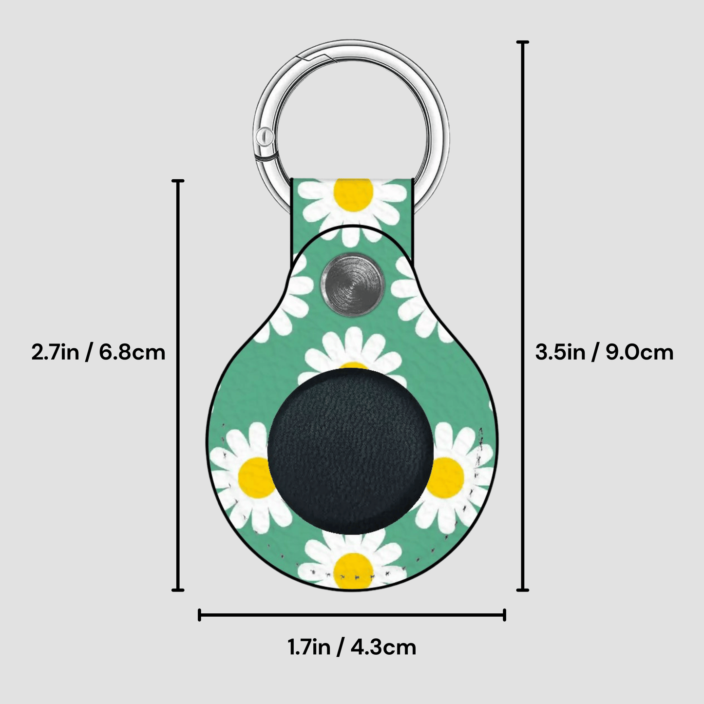 Keychain with daisy pattern and measurements on a gray background