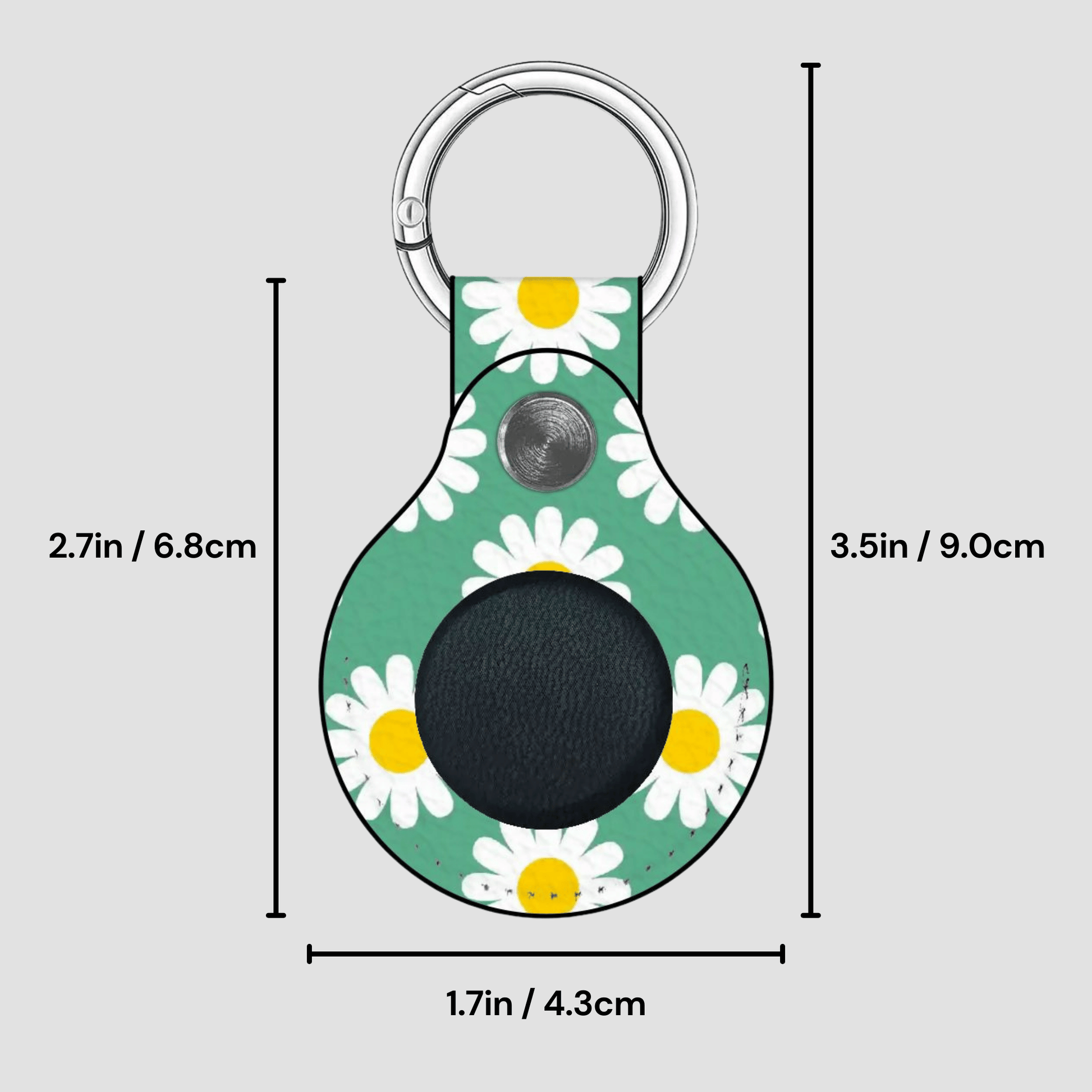 Keychain with daisy pattern and measurements on a gray background