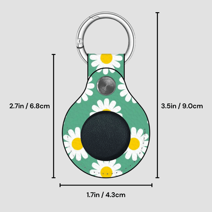 Keychain with daisy pattern and measurements on a gray background