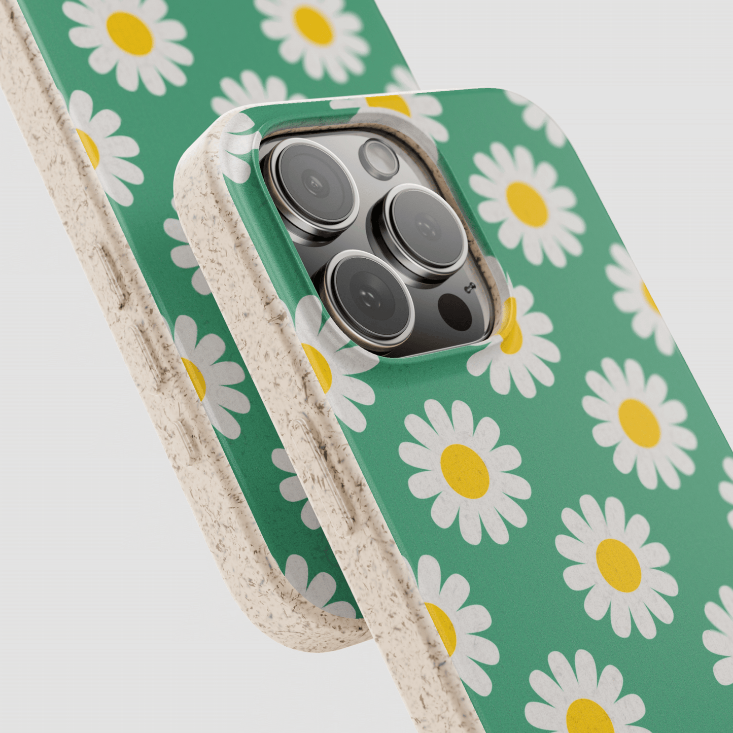 Phone case with daisy pattern on a green background