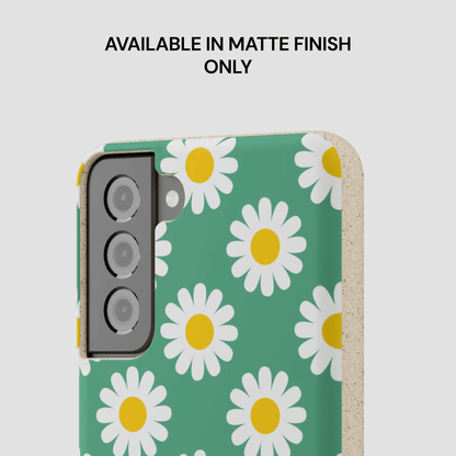 Phone case with daisy pattern on a green background