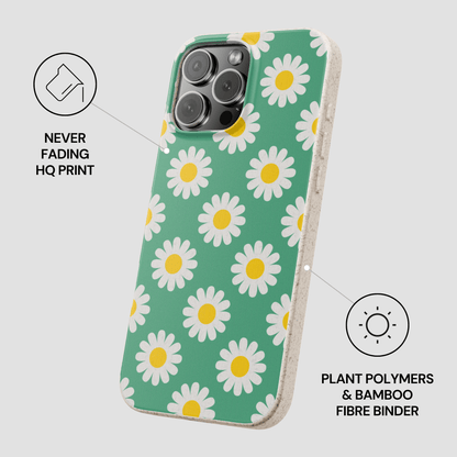 Phone case with daisy pattern on a green background