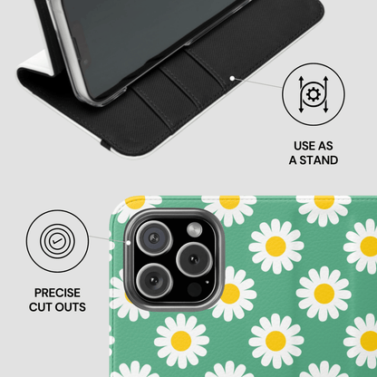 Phone case with daisy pattern and stand feature on a white background