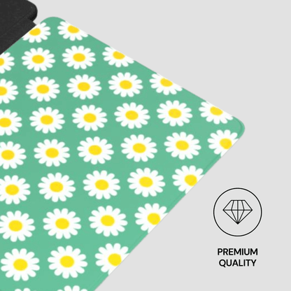 Yoga mat with daisy pattern on a green background