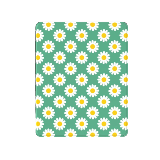 Notebook with daisy pattern on a green background