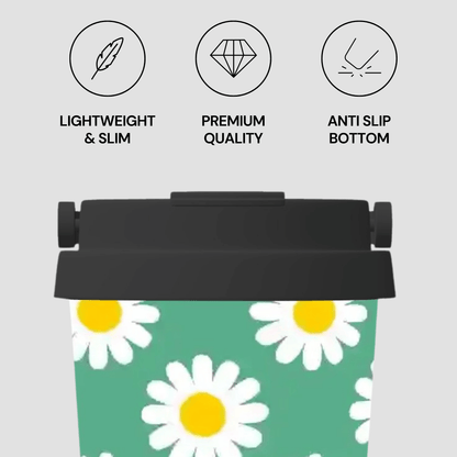 Tumbler with daisy pattern and features listed on a light gray background