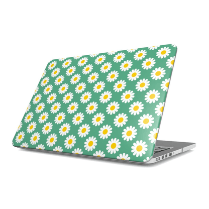 Laptop with a daisy pattern on a green background