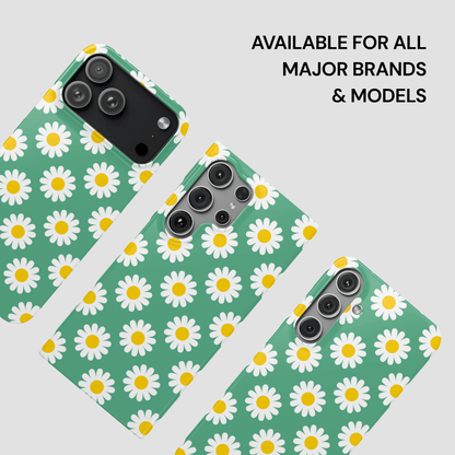 Green phone case with white daisy pattern on a light gray background
