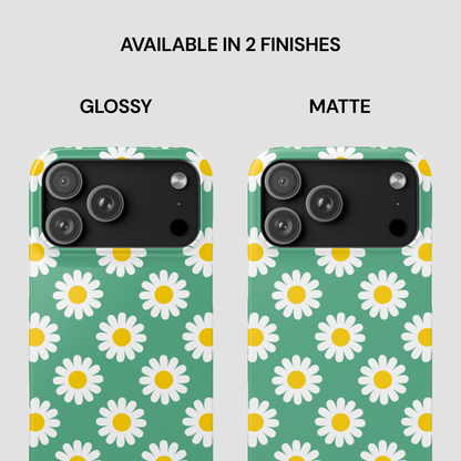 Two phone cases with daisy pattern, one glossy and one matte, on a light gray background.