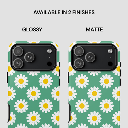 Two phone case designs with daisy pattern, one glossy and one matte, on a light gray background.