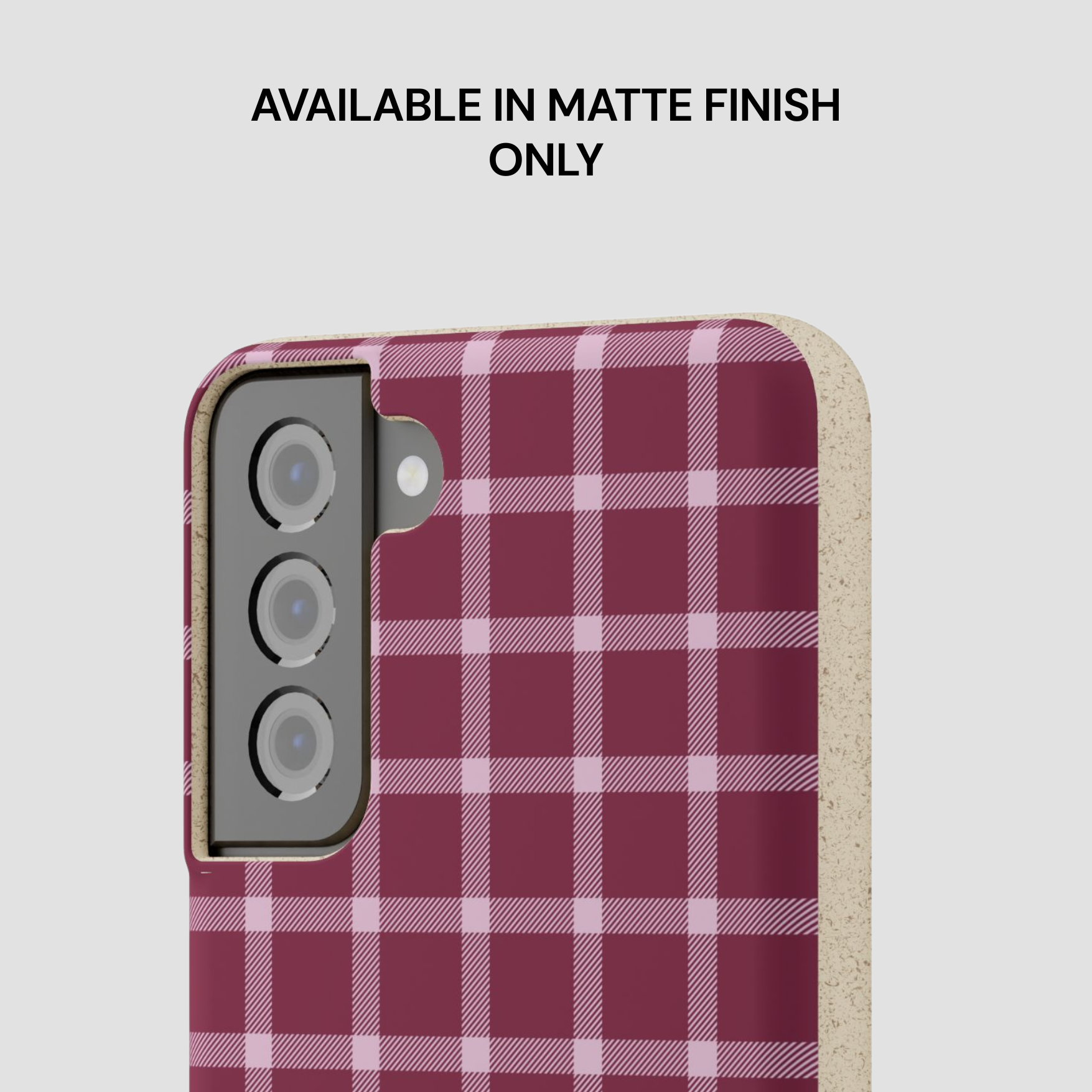 Plaid patterned phone case with text indicating matte finish only on a light gray background