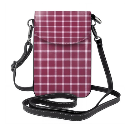 Plaid patterned crossbody bag with a strap on a white background