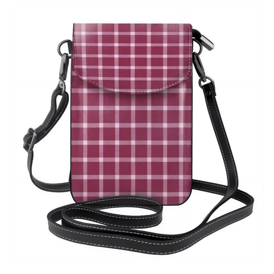 Plaid patterned crossbody bag with a strap on a white background