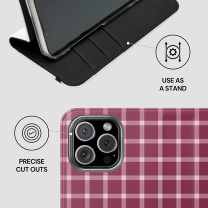 Phone case with plaid pattern and stand feature on a light gray background