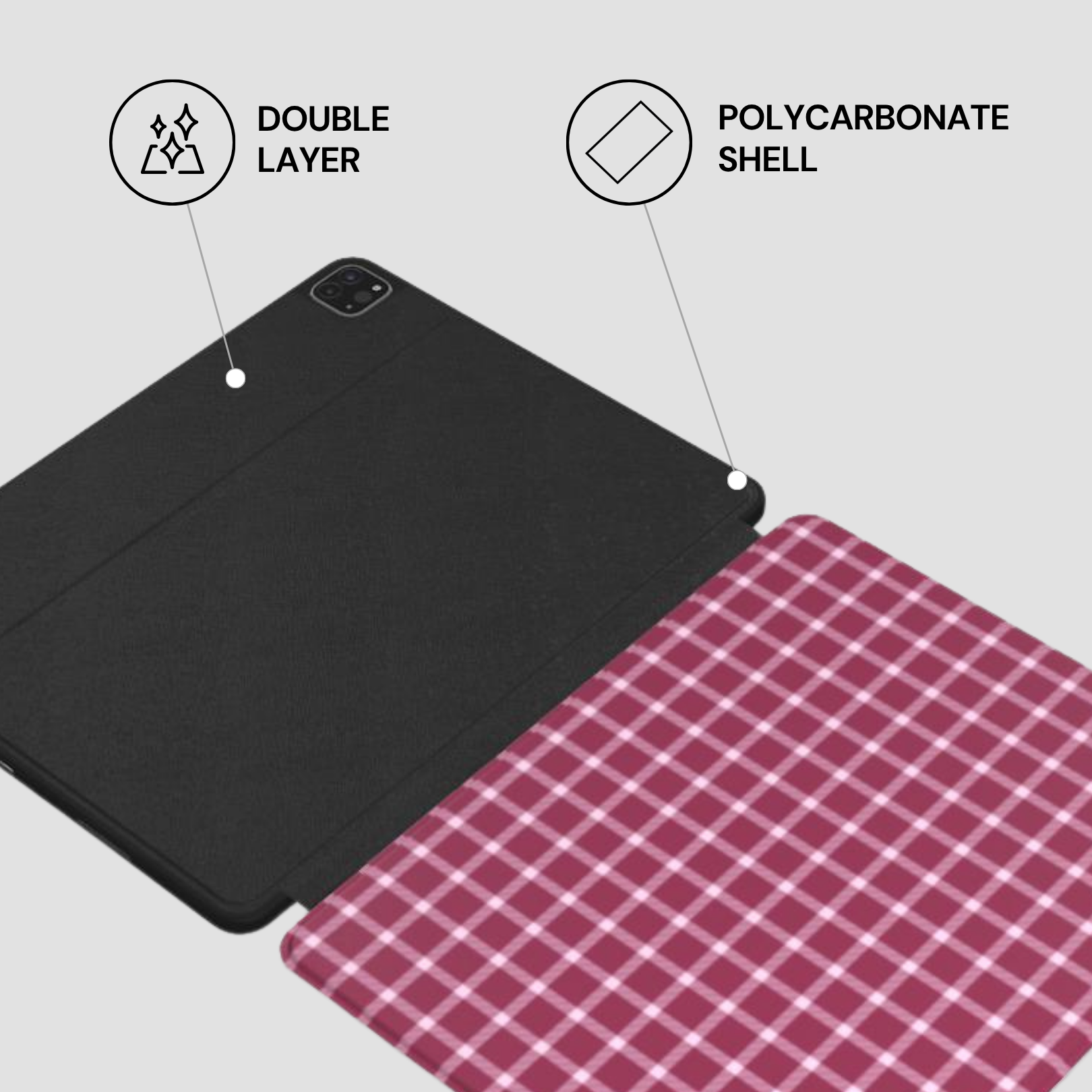 Black tablet case with polycarbonate shell and double layer feature on a gray background