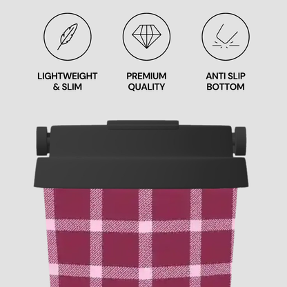 Plaid bag with black top and bottom, featuring icons and text about product features on a light gray background.