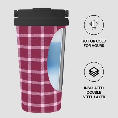 Plaid-patterned tumbler with black lid on a light gray background