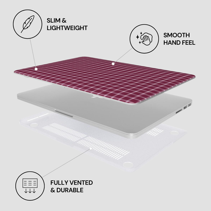 Laptop with grid pattern on a white background, featuring text labels about its features.