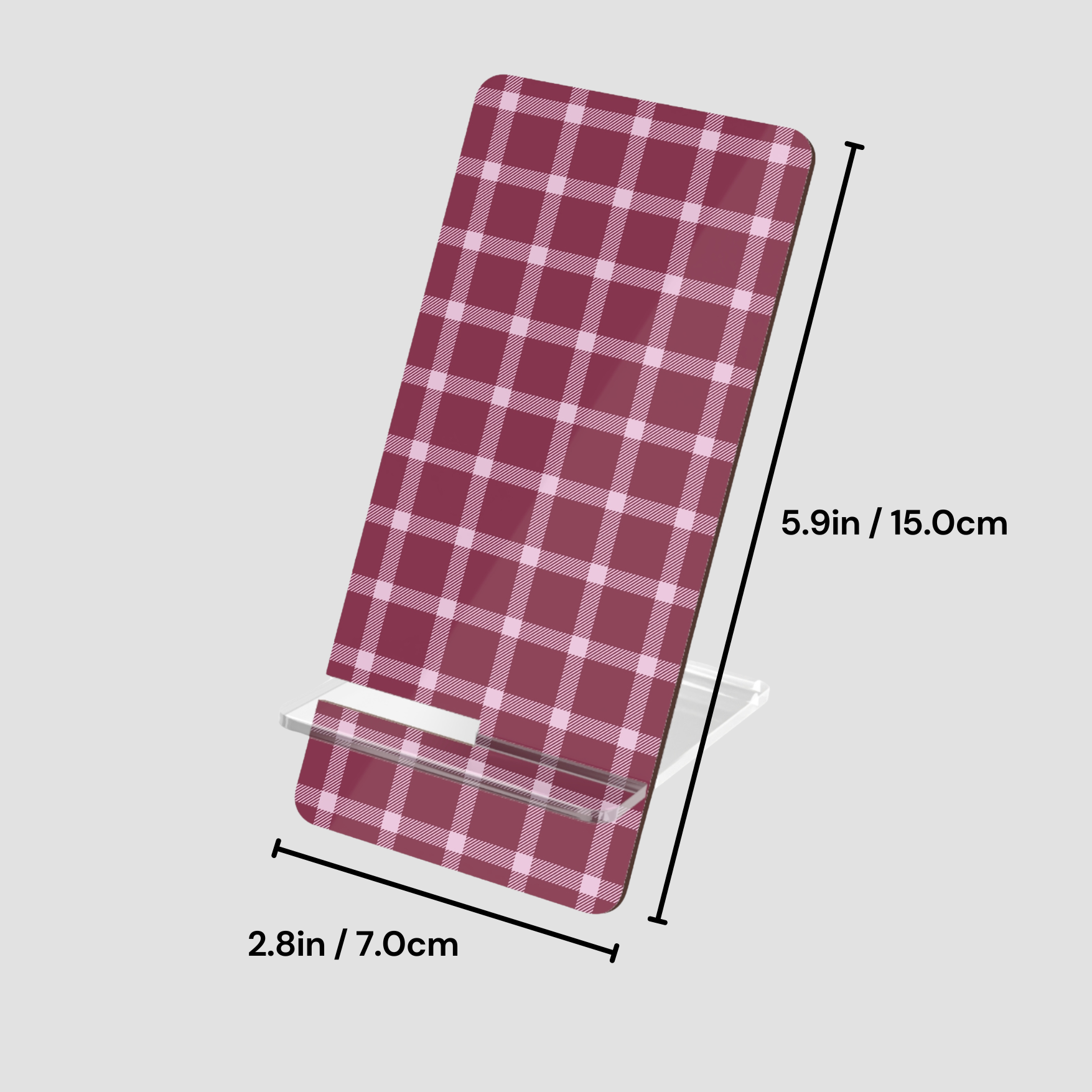Red and white plaid phone stand with dimensions on a gray background
