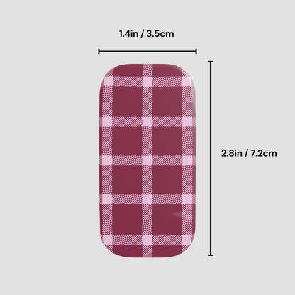 Red and white checkered rectangular object with measurements on a gray background
