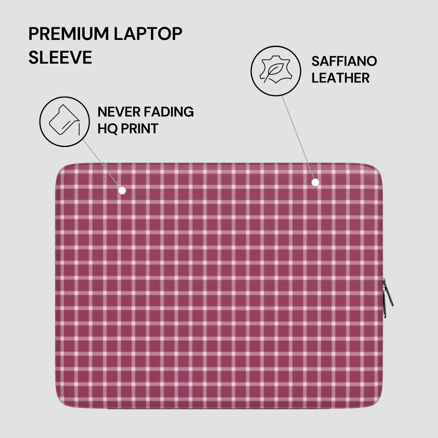 Plaid laptop sleeve with saffiano leather finish on a light gray background