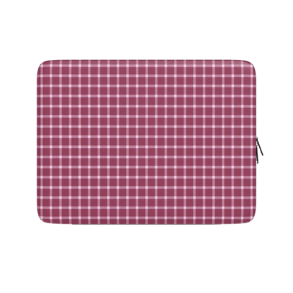 Plaid patterned pouch on a white background