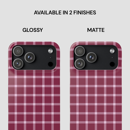 Two phone cases with red and white plaid pattern, one glossy and one matte, on a light gray background.