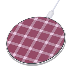 Wireless charging pad with pink plaid pattern on a white background