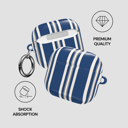 Blue and white striped case with a keychain on a light gray background