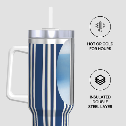 Blue striped insulated tumbler with handle on a light gray background