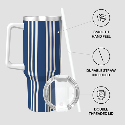 Blue striped tumbler with features highlighted on a gray background