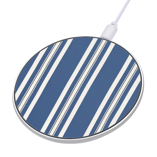 Round wireless charging pad with blue and white striped design on a white background