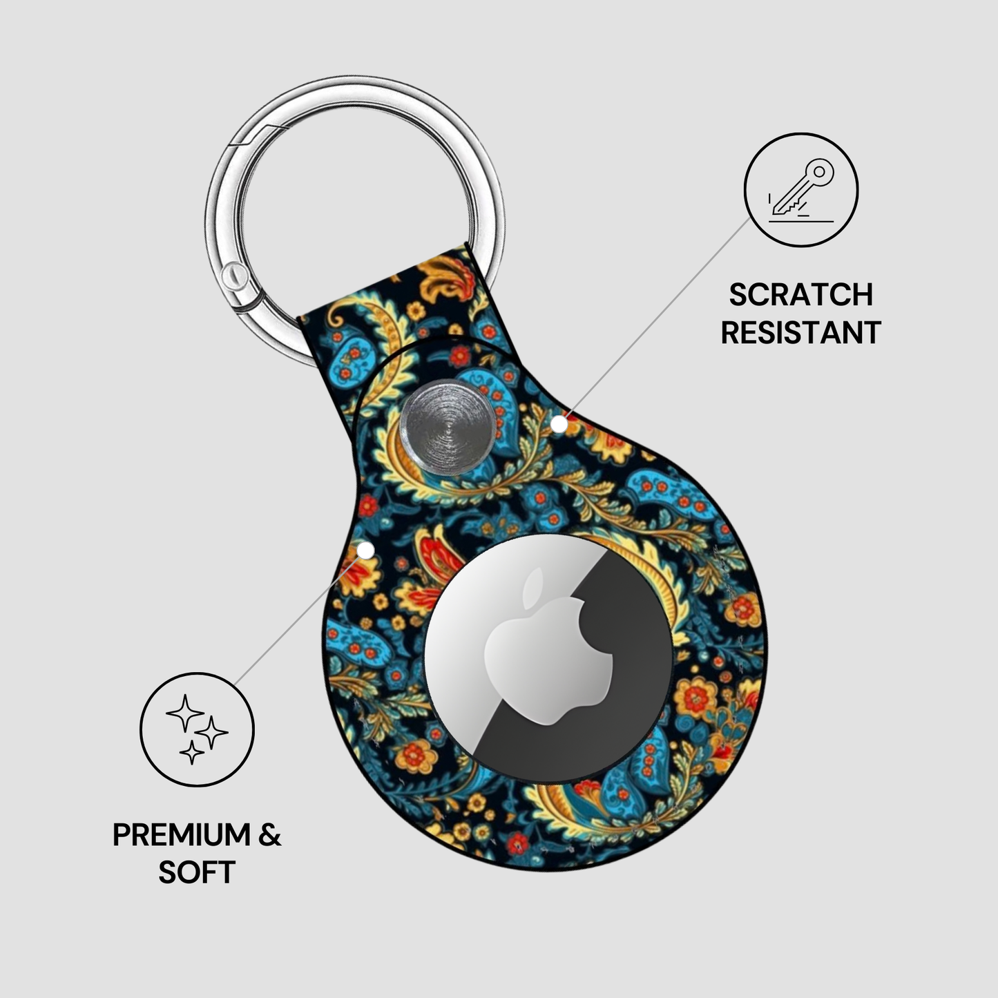 Decorative keychain case with floral pattern for Apple product on a light gray background