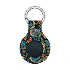 Decorative keychain with floral pattern on a white background
