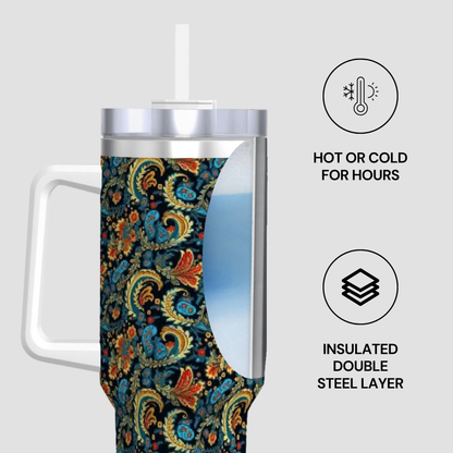 Insulated tumbler with paisley design on a white background