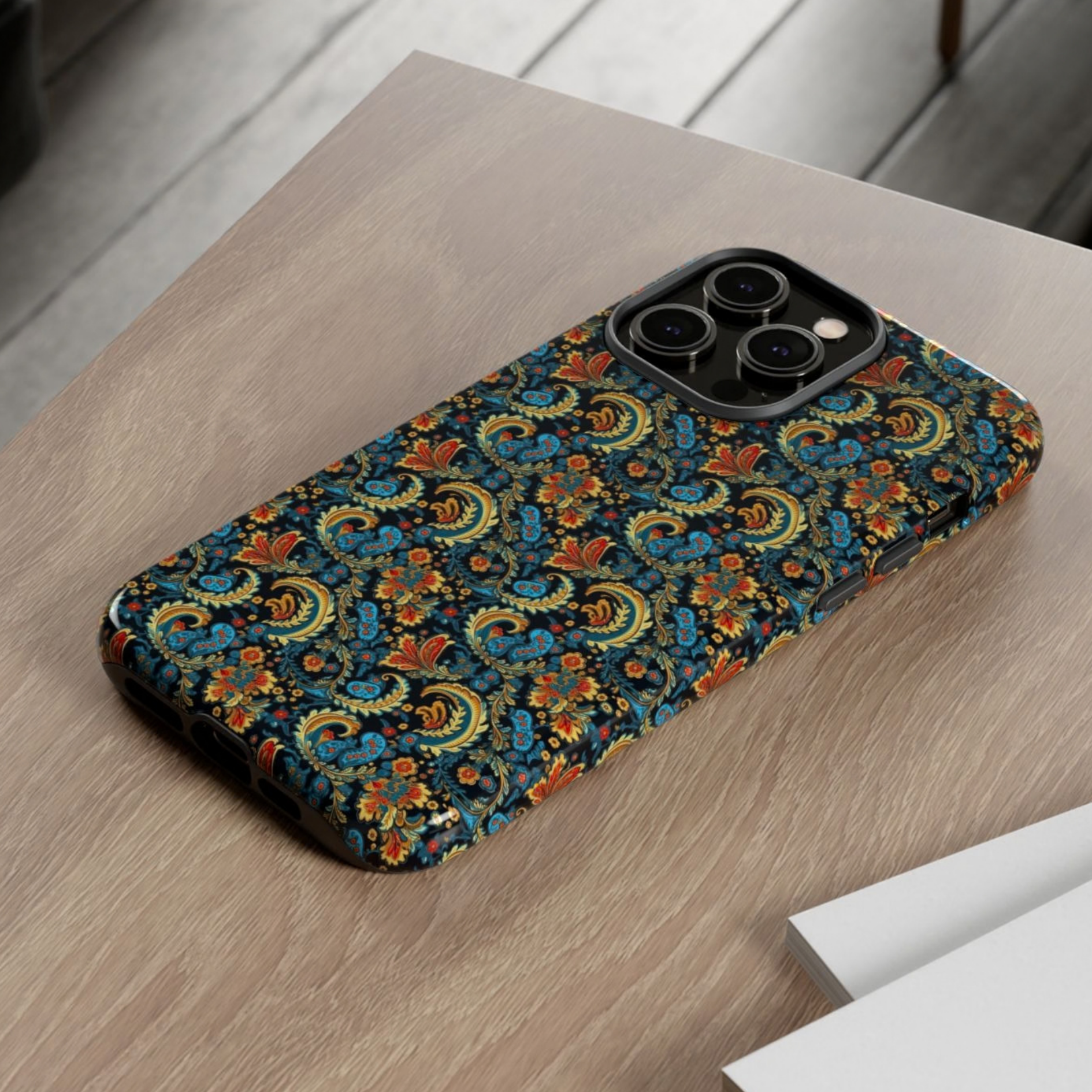 Phone case with a colorful pattern on a wooden surface