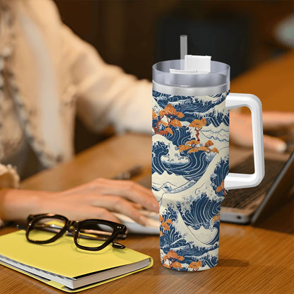 Tumbler with wave design on a desk with a person using a laptop. | Casenari