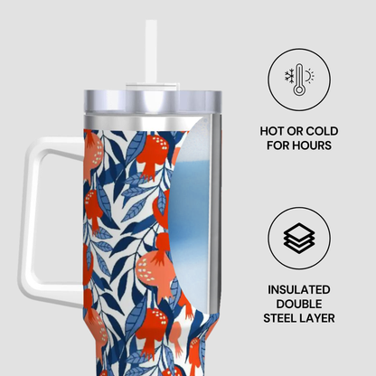 Insulated tumbler with floral design on a white background
