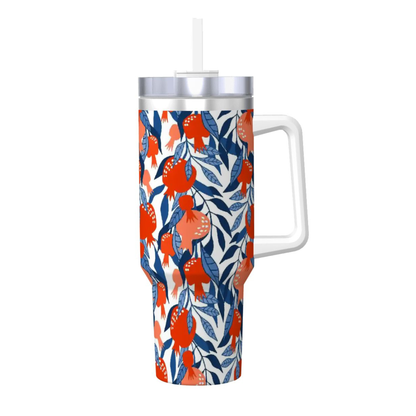 Tumbler with floral pattern and handle on a white background