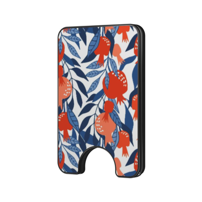 Pom Blossom Magnetic Wallet with a botanical pattern featuring coral blossoms and blue leaves