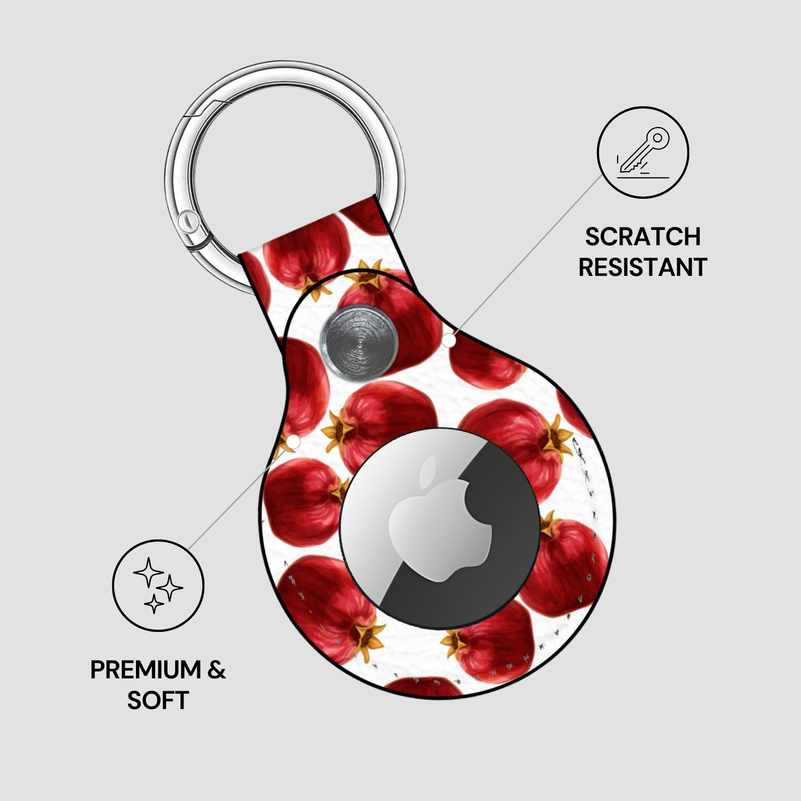 Keychain with red floral design and Apple logo on a gray background