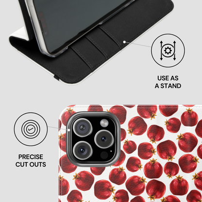 Phone case with pomegranate pattern and stand feature on a white background